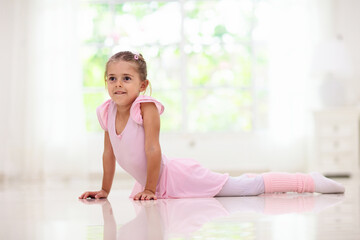 Baby ballet. Little ballerina girl in dance class.