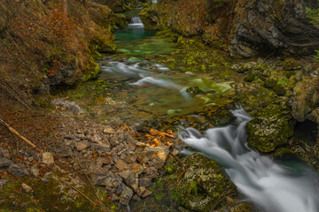 Naklejka na ściany i meble Sum waterfall on Radovna river in spring color fresh Slovenia