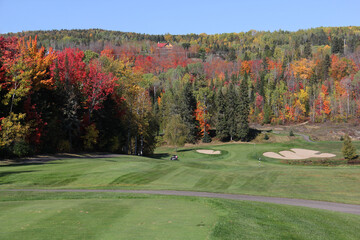 Scenic golf holes in the fall season