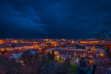 Prague capital from castle hill with dark spring blue sky