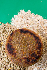 Fresh burger on some lentil and quinoa grains