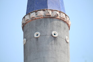 Minaret of masjid blue sky background