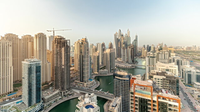 Panorama showing various skyscrapers in tallest recidential block in Dubai Marina aerial timelapse © neiezhmakov