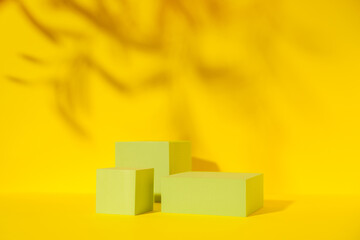 Beauty cosmetics product presentation mockup podium on sunny yellow background. Stylish minimal scene for body care products exhibit, front view, copy space.