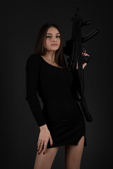 Young Woman With Hand Gun