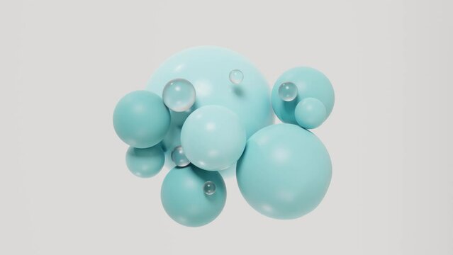 Slow motion video of blue spheres floating in the air