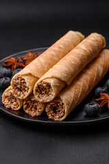 Delicious crispy wafer rolls with cream filling with nuts