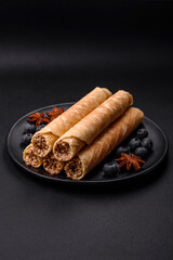 Delicious crispy wafer rolls with cream filling with nuts