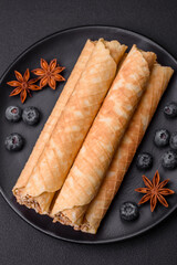 Delicious crispy wafer rolls with cream filling with nuts