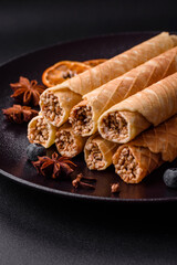 Delicious crispy wafer rolls with cream filling with nuts
