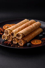 Delicious crispy wafer rolls with cream filling with nuts