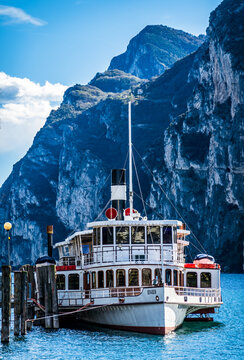 Riva del Garda, Italy - March : passenger ferry at the old Town and port of Riva del Garda at the Lago di Garda on March , 2023