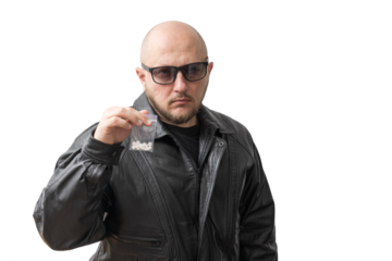 Dangerous bald man in black leather jacket and sunglasses holding plastic transparent bag with round white pills, drug dealer offering narcotics, isolated on transparent background