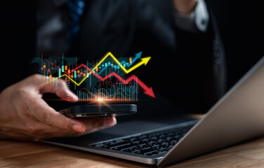 Businessman management finance and investment concept, Capital gain world money economic growth. coin stack financial graph chart, market report on cash currency, Stock market instability concept.