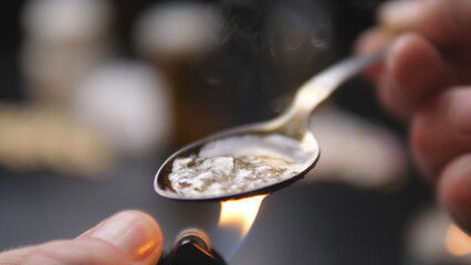 addict preparing dose of crack