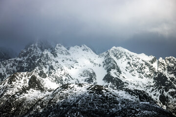 Fototapeta na wymiar Winter stormy landscape over Lofoten archipelago mountains, Norway, Europe