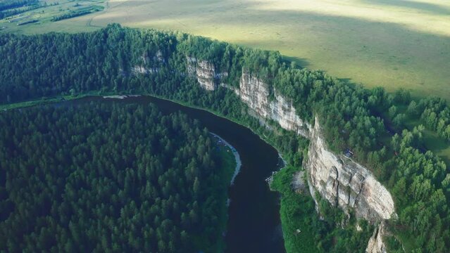 Stunning aerial view of river Ai and famous rocks in Chelyabinskaya oblast, Russia. Nature of Ural mountains. Aiskiye pritesi