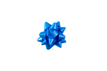 Blue bow for a gift on an isolated white background. Top view, flat lay