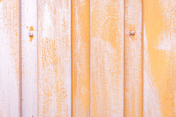 Yellow and white weathered painted garage wall texture bg