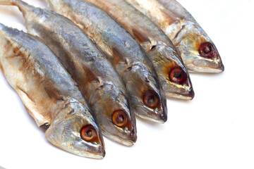 Salted fish on white background.