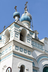 Fototapeta premium Ancient orthodox temple blue sky background