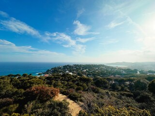 Overview from the Mirador Del Pinell viewpoint over S'Agaró an upmarket resort on the Costa Brava between Sant Feliu de Guíxols and Platja d'Aro with exclusive houses and hotels, Catalonia, Spain