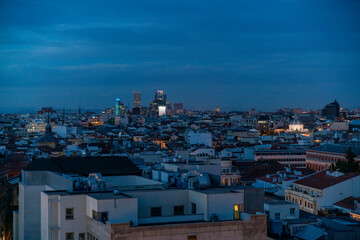View of the skyline cityscape of Madrid after sunset illuminated, Spain