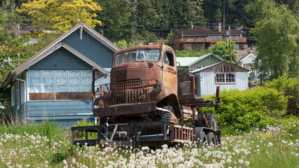 rusty truck outside. deteriorated truck vehicle. old abandoned truck covered in rust. corroded truck