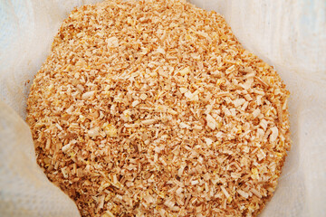 sawdust and shavings in bag. material for agriculture. mulch 