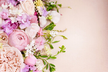 Delicate blooming festive roses and pink summer flowers, blossoming rose flower soft pastel background, bouquet floral card