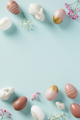 Naklejka na ściany i meble Happy Easter vertical banner design with Easter eggs, bunnies, flowers on pastel blue background.