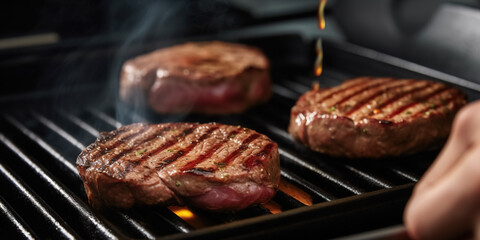 A chef is grilling a beef steak on a pan and the black background for copy space text restaurant menu.