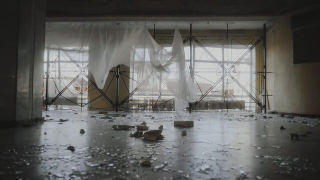 Borodyanka. Destroyed house of culture, broken windows as a result of bombings. 