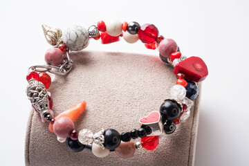 double  bracelet  with black and red  semipreciouse stones with natural lava, shungite,  hematite,  rhodonite, coral  and chains.