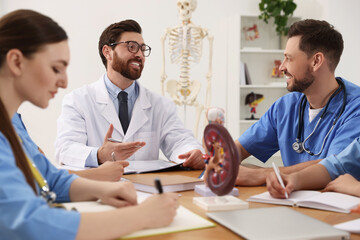 Doctor giving lecture for interns in university
