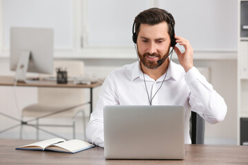 Hotline operator with headset working in office, space for text