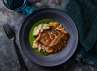 Gourmet fish with lentils, vegetables and sauce