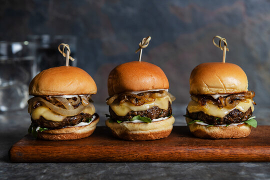 gourmet beef sliders with cheese and caramelized onions