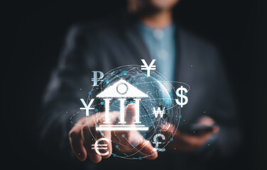 Businessman using smartphone with central banking and international currency include dollar Yuan Yen Pound sterling and Euro for forex and currency exchange money transfer concept. Business, finance