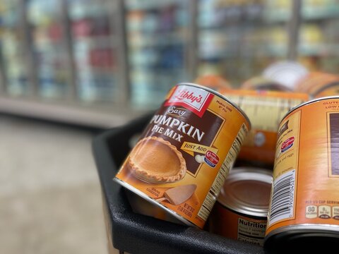 Grocery store Libbys canned pumpkin in a bin