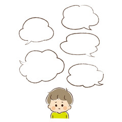 一度にたくさんの情報を与えられ戸惑っている男児の上半身