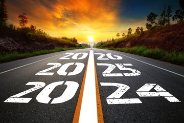  Text 2024-2026 written on the road in the middle of asphalt road with at sunset. Concept of planning, goal, challenge, new year resolution,noise, selective focus 