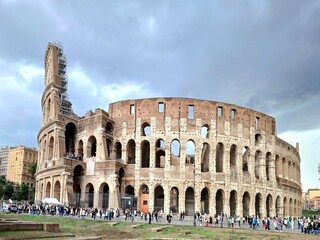 Fototapeta na wymiar Colosseum in Rome Arena Also known as the Flavian Amphitheater Colossal work of the Roman Empire with visiting tourists , 30 