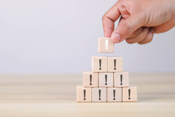 wooden blocks with exclamation marks arranged or arranged