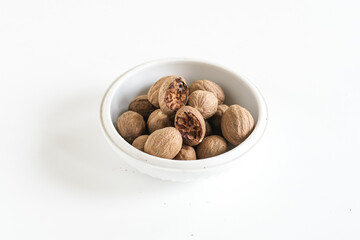 nutmeg isolated white, selective focus

