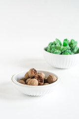 raw and candid nutmeg isolated white
