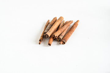 kayu manis or cinnamon stick isolated white background
