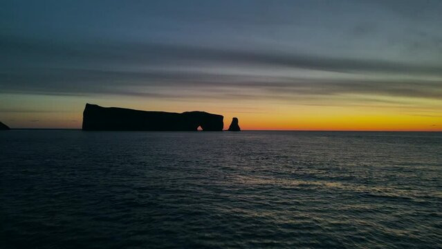 Drone view at sunrise of famous perce rock in Perc&eacute;, Qu&eacute;bec, Canada