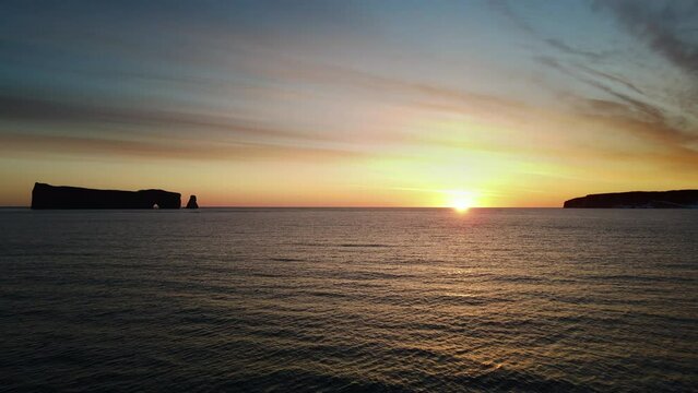 Drone view at sunrise of famous perce rock in Perc&eacute;, Qu&eacute;bec, Canada