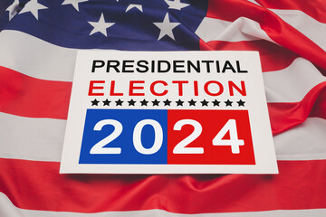 Presidential election 2024 text on white paper over the American flag background
